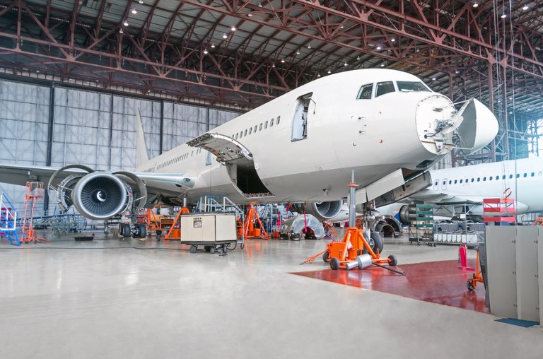 Passenger Airplane On Maintenance Of Engine And Fuselage Repair